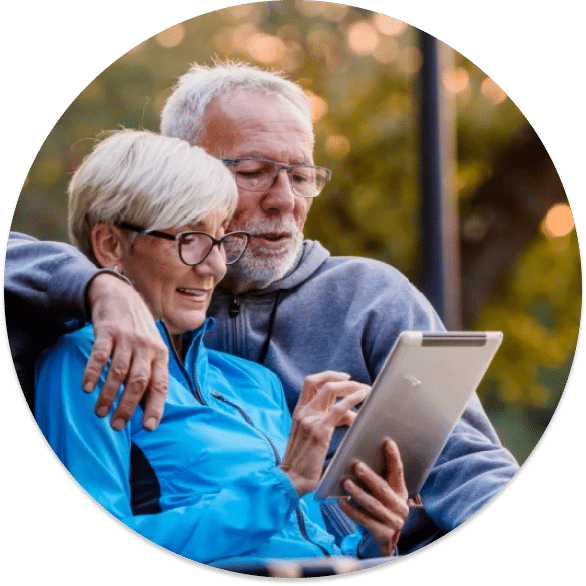 happy older couple reading their rental financial reports